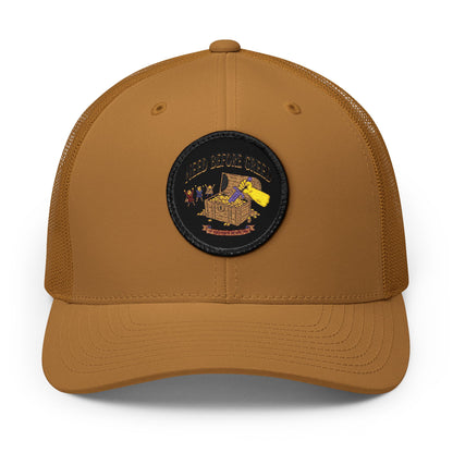 Embroidered Trucker Cap — 'Need Before Greed' Patch