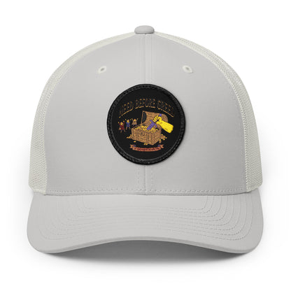 Embroidered Trucker Cap — 'Need Before Greed' Patch