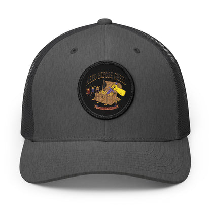 Embroidered Trucker Cap — 'Need Before Greed' Patch