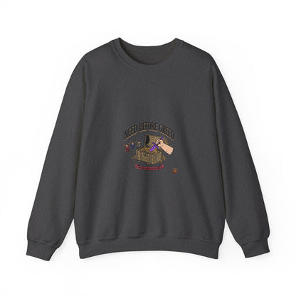 Crewneck Sweatshirt — "Need Before Greed" Chest Graphic (Sustainable Giving Vibe)