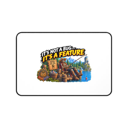 Desk Mat — “It’s Not a Bug… It’s a Feature” Fishing Cabin Gaming Desk Mat