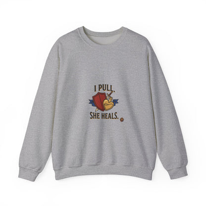 Crewneck Sweatshirt — “I Pull, She Heals” Veterinary/Animal Rescue Crewneck