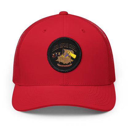 Embroidered Trucker Cap — 'Need Before Greed' Patch