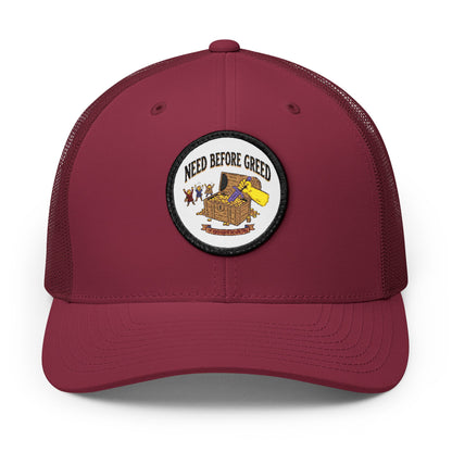 Embroidered Trucker Cap — 'Need Before Greed' Patch